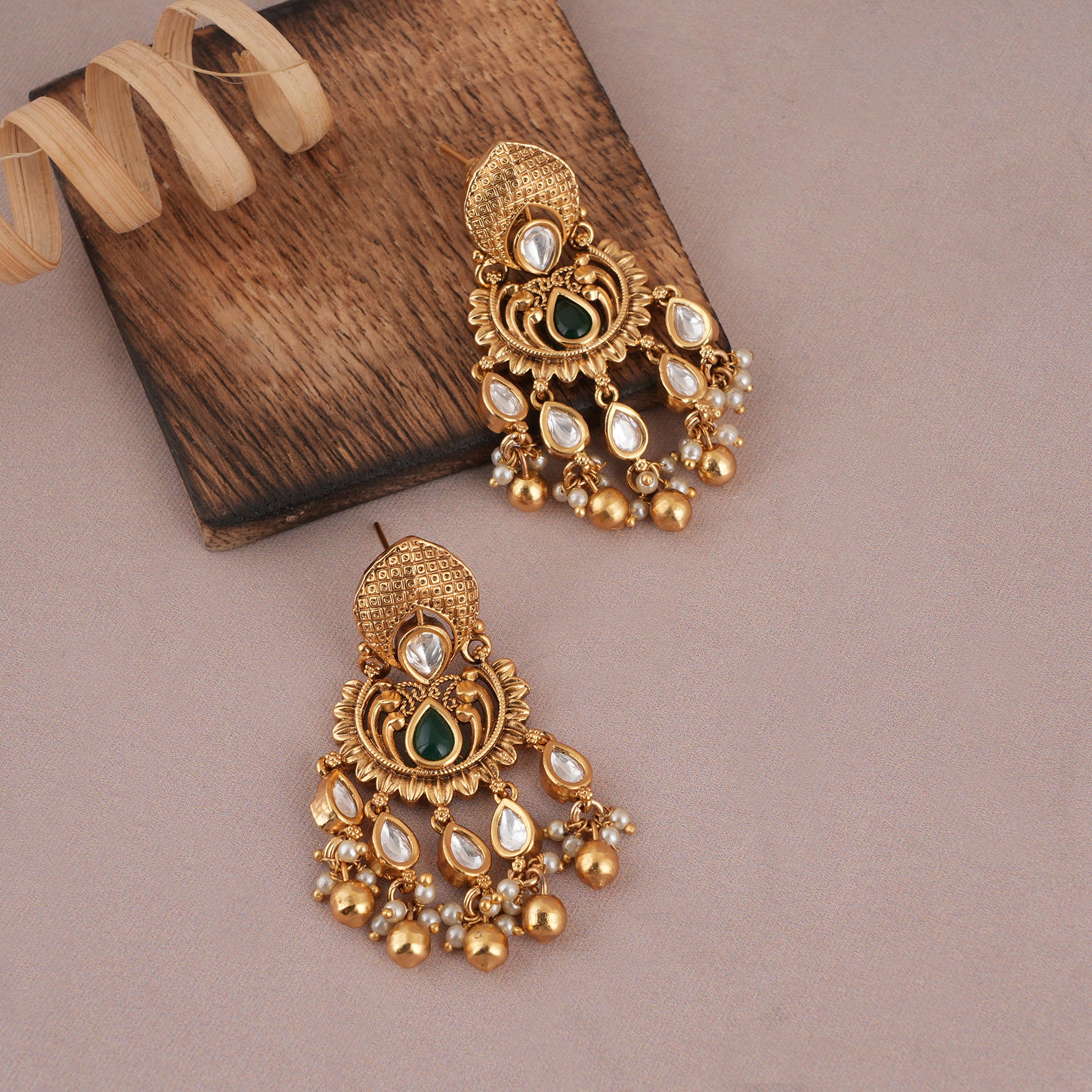 Cute gold kundan stone earring