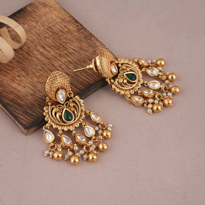 Cute gold kundan stone earring