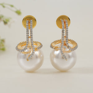 Stunning pearl drop diamond studed dangler earring