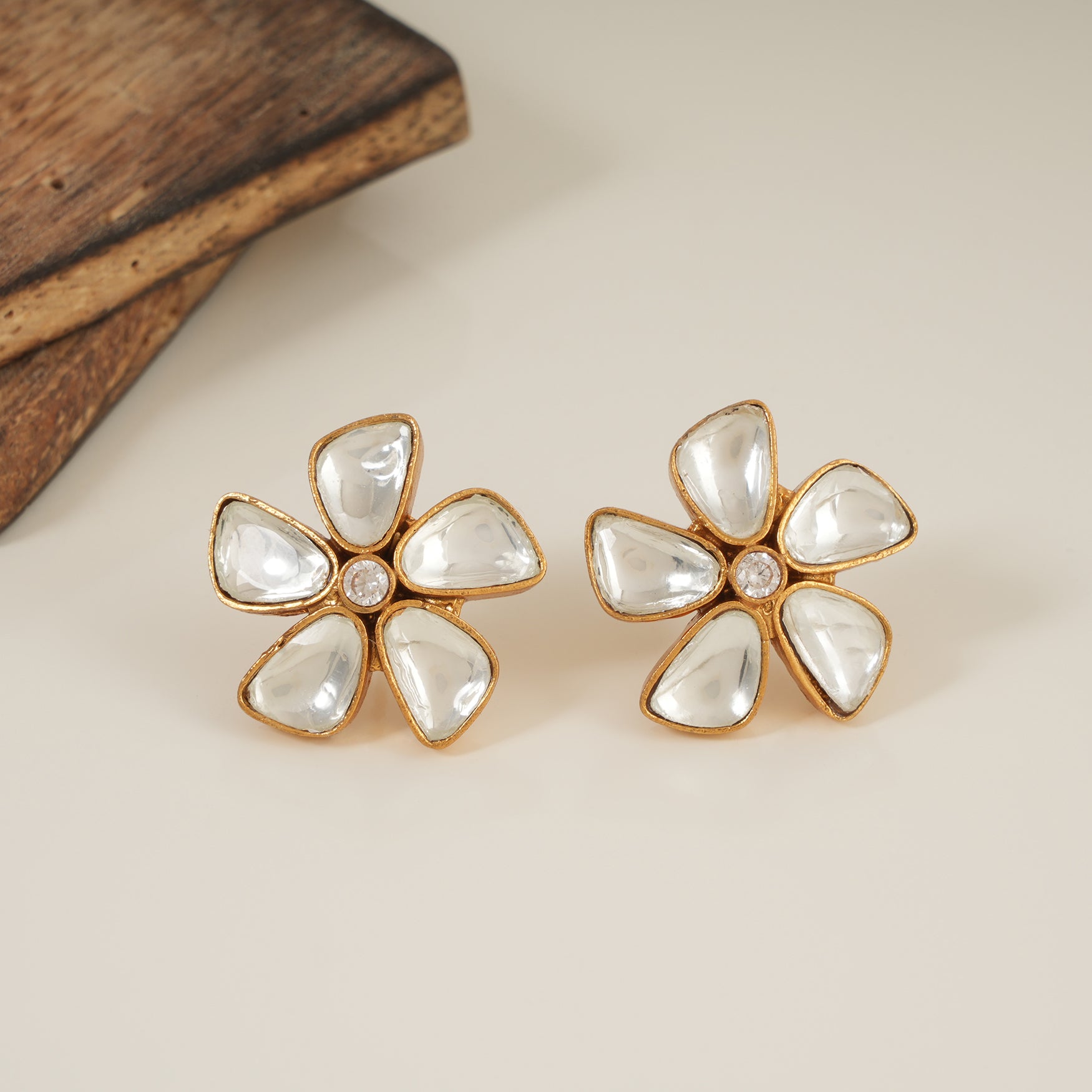 Cute floral gold plated kundan studs