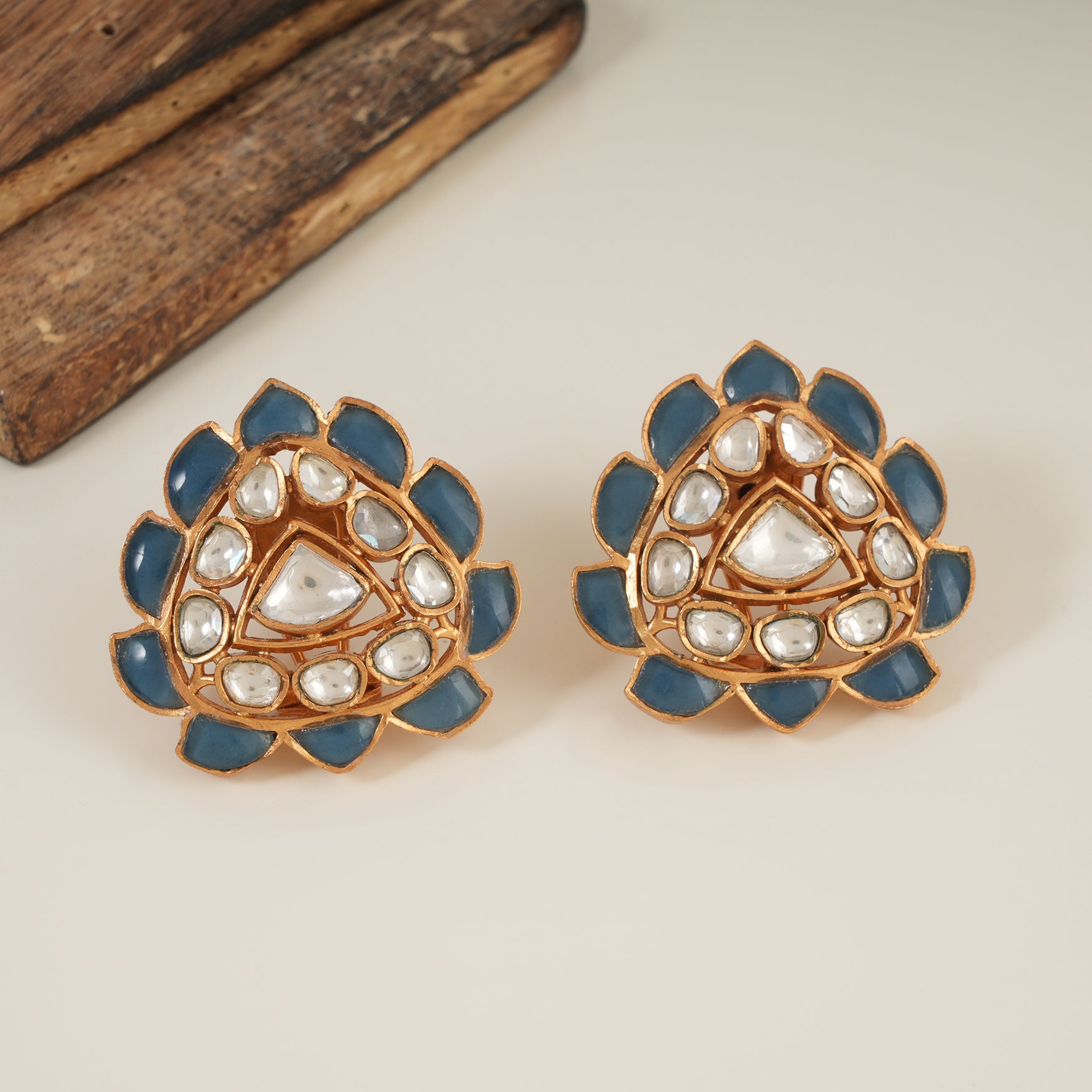 Stunning gold plated blue stone kundan studs