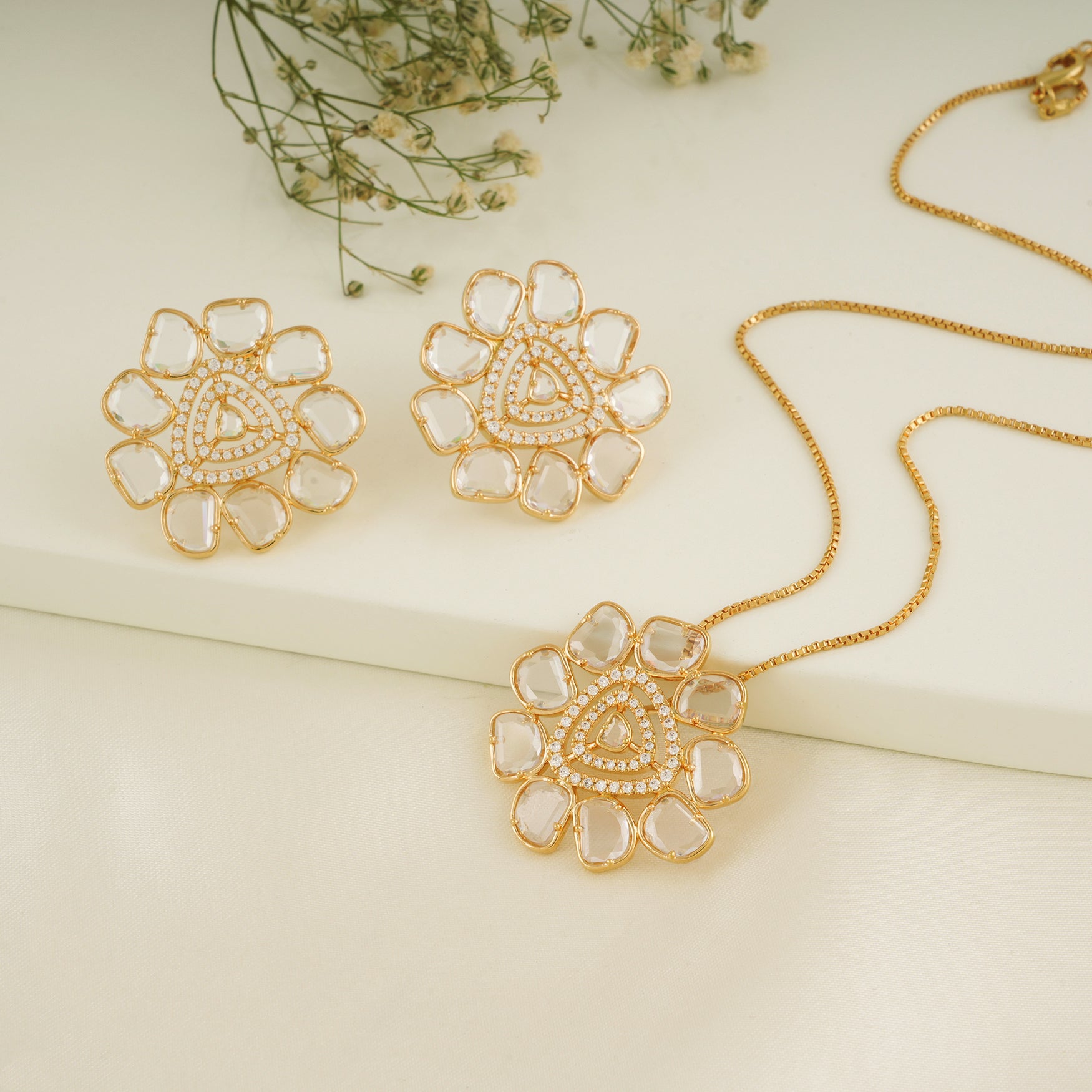 Stunning gold plated dimaond slice floral pendant set