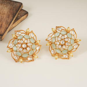 Stunning gold plated stone kundan spiral floral stud earring