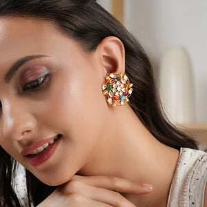 Stunning gold plated stone kundan spiral floral stud earring
