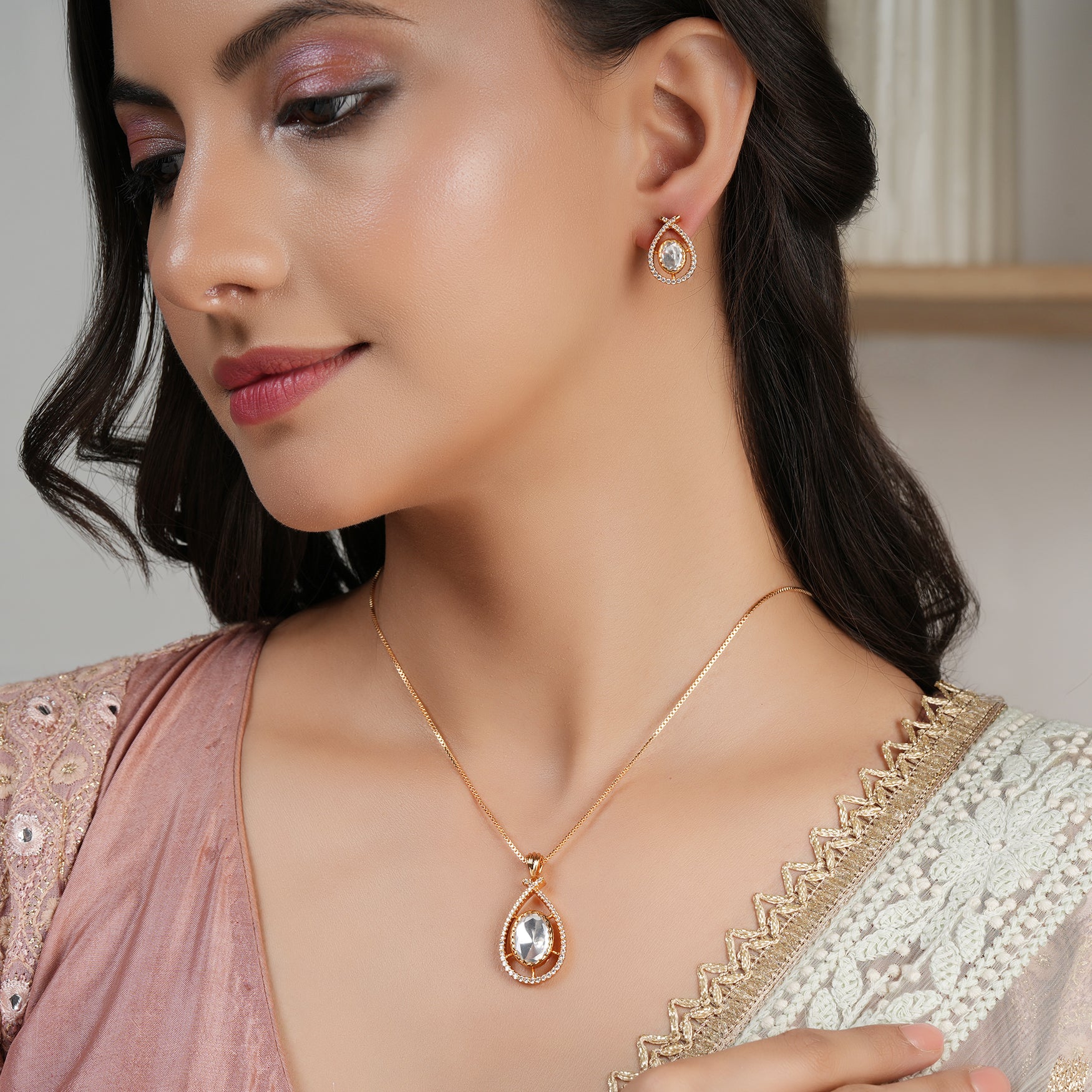 Stunning pear shaped kundan gold plated pendant set