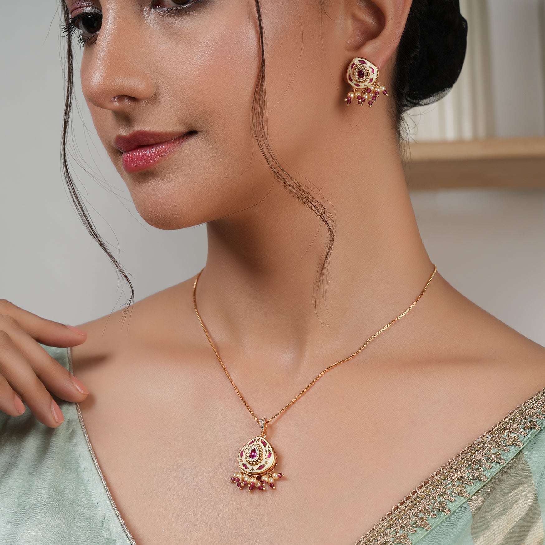 Gorgeous gold plated meenakari pendant set with earring