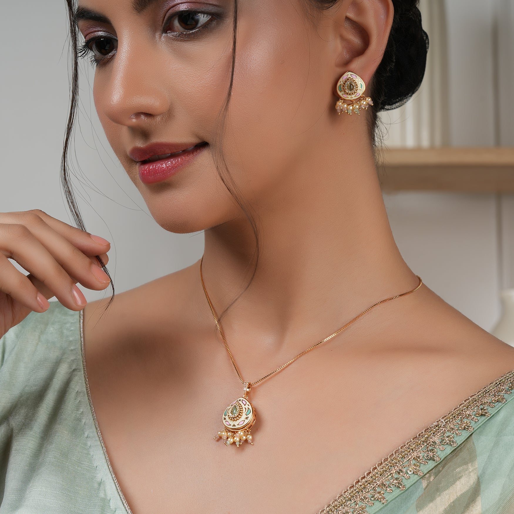 Gorgeous gold plated meenakari pendant set with earring