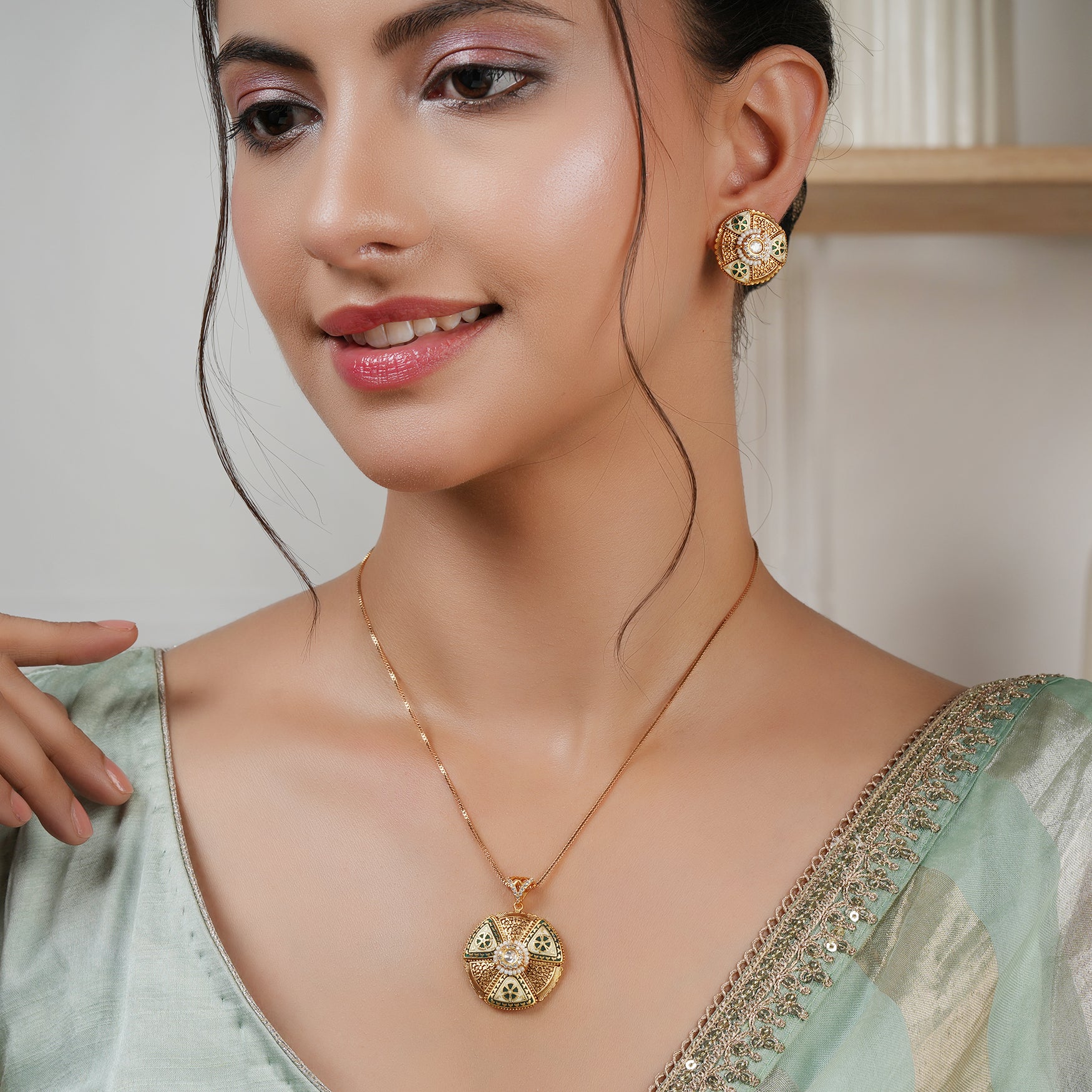 Gold plated meenakari round pendant set