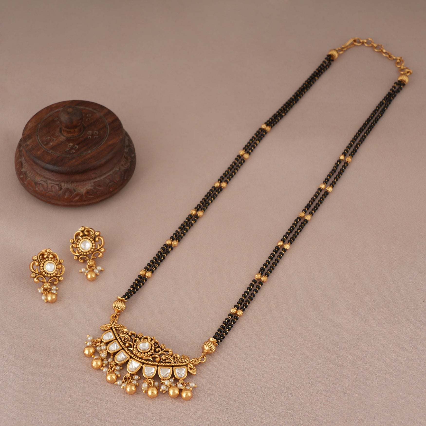 Cute antique gold kundan long mangalstura with earring