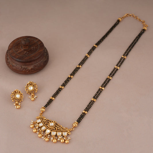 Cute antique gold kundan long mangalstura with earring