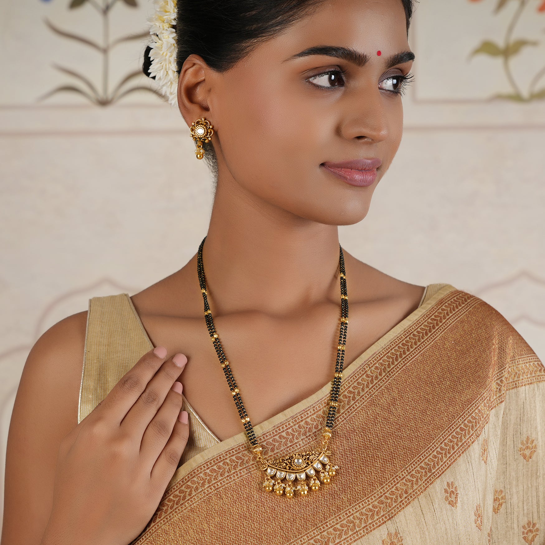 Cute antique gold kundan long mangalstura with earring