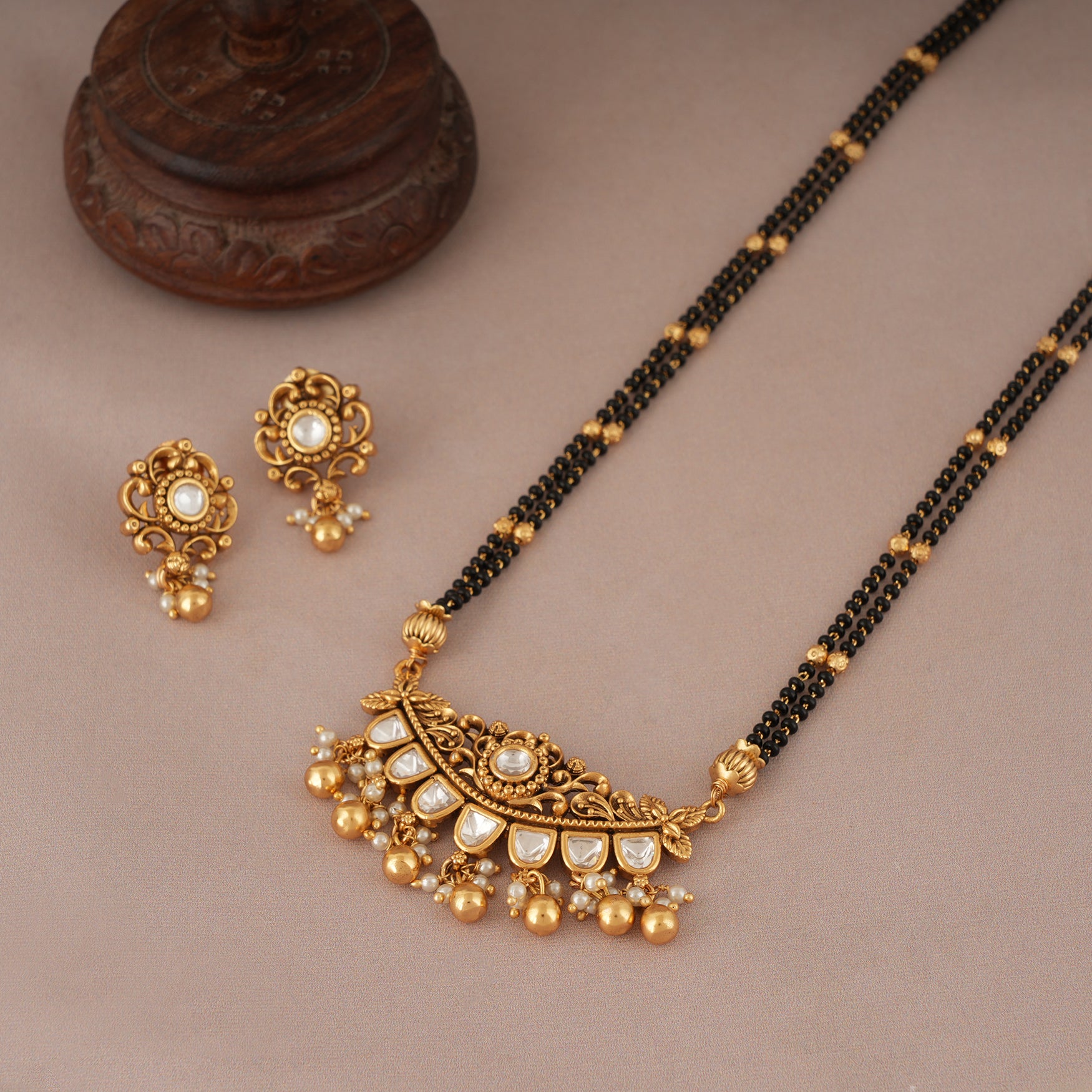 Cute antique gold kundan long mangalstura with earring