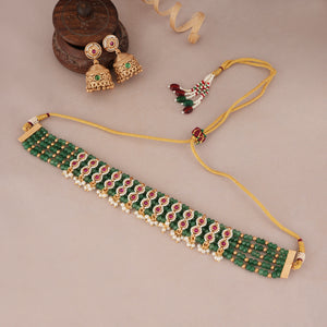 Stunning gold plated green stone choker set with jhumka earring