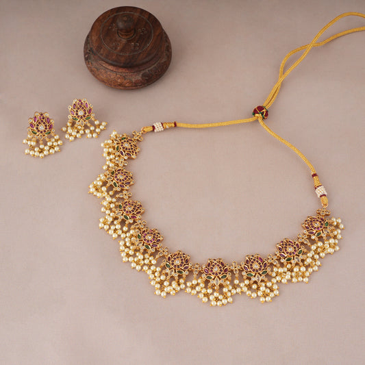 Stunning gold lotus inspired pearl drop necklace set