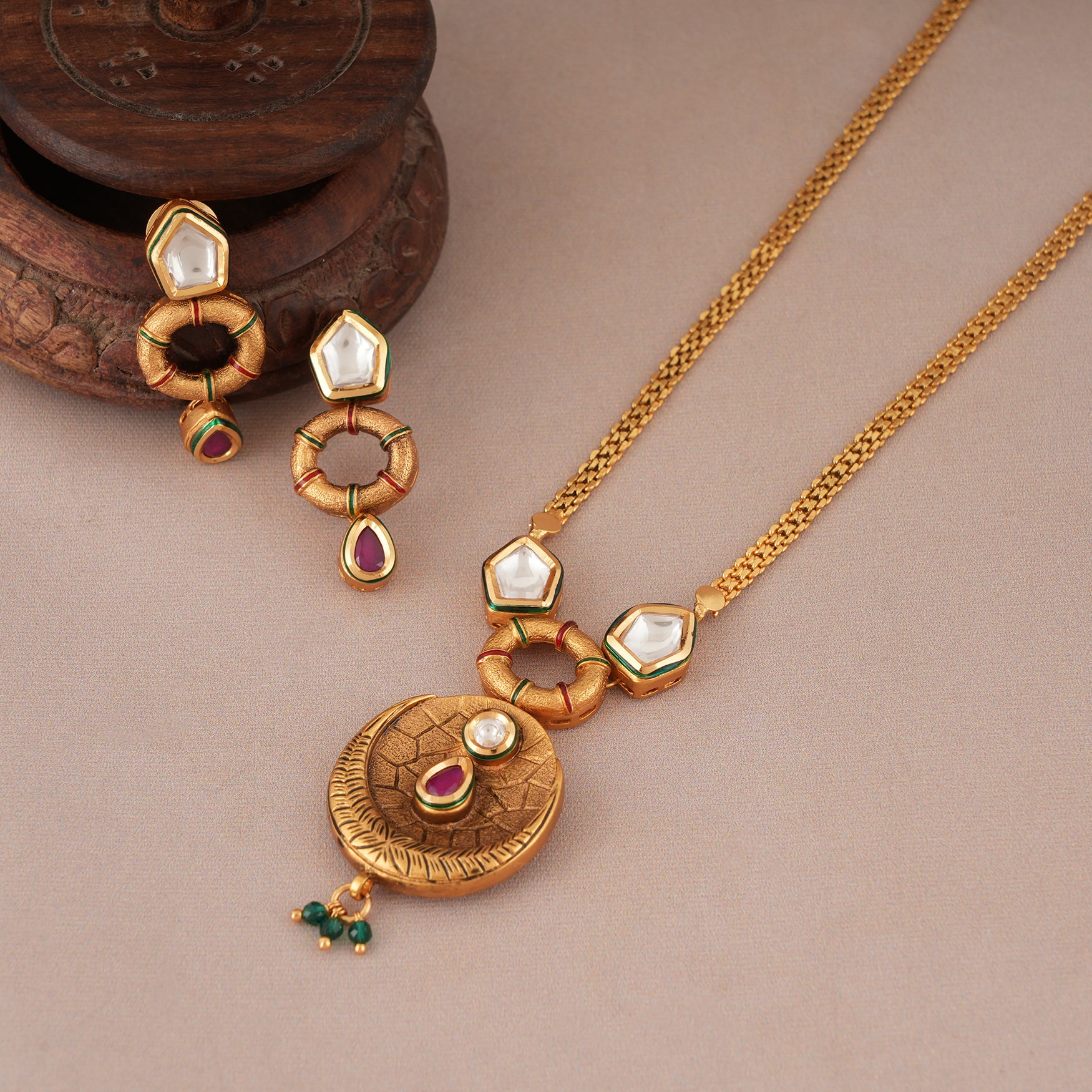 Cute antique gold kundan stone drop pendant set