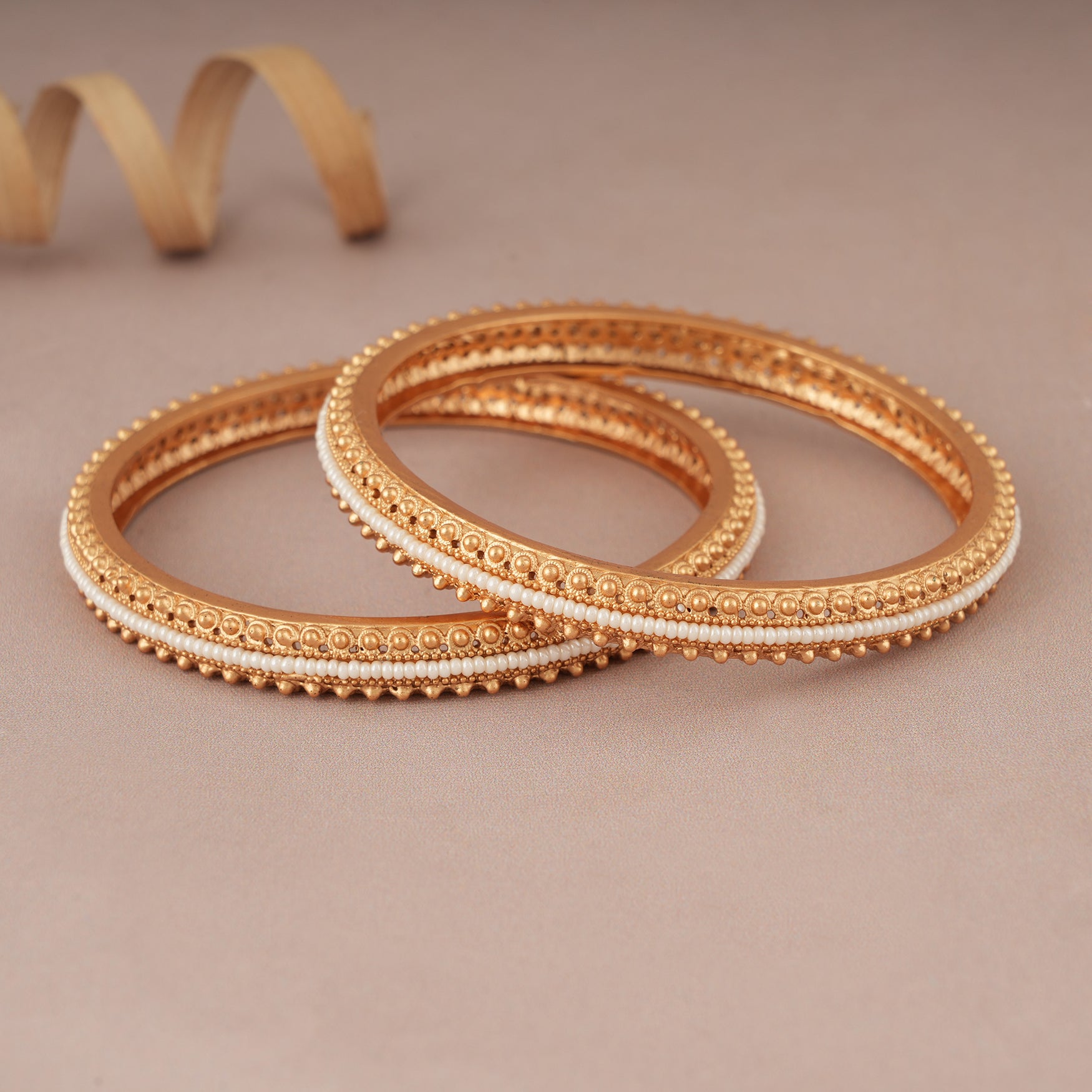 Elegant pearl line gold plated bangle set