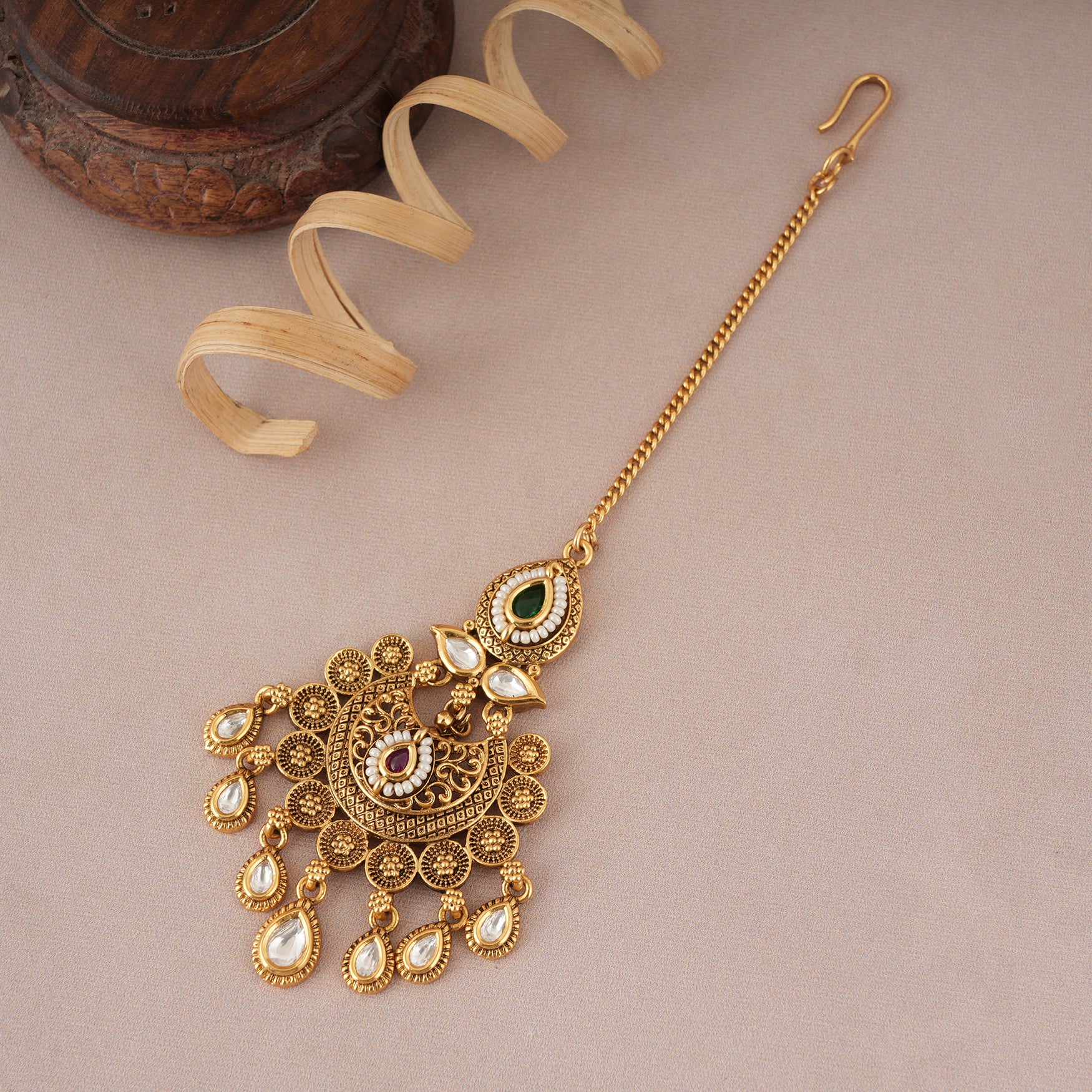 Stunning gold plated kundan maangtika