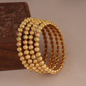 Elegant Pearl Lined Gold Bangles
