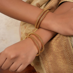 Stunning antique gold plated plain bangle set (set of 4)