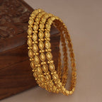 Sleek elegant antique gold plain bangle set (set of 4)