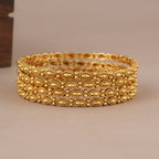 Sleek elegant antique gold plain bangle set (set of 4)