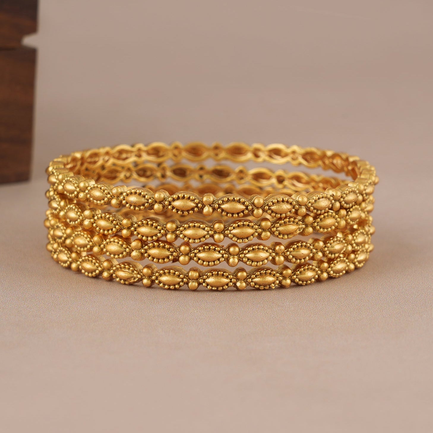 Sleek elegant antique gold plain bangle set (set of 4)