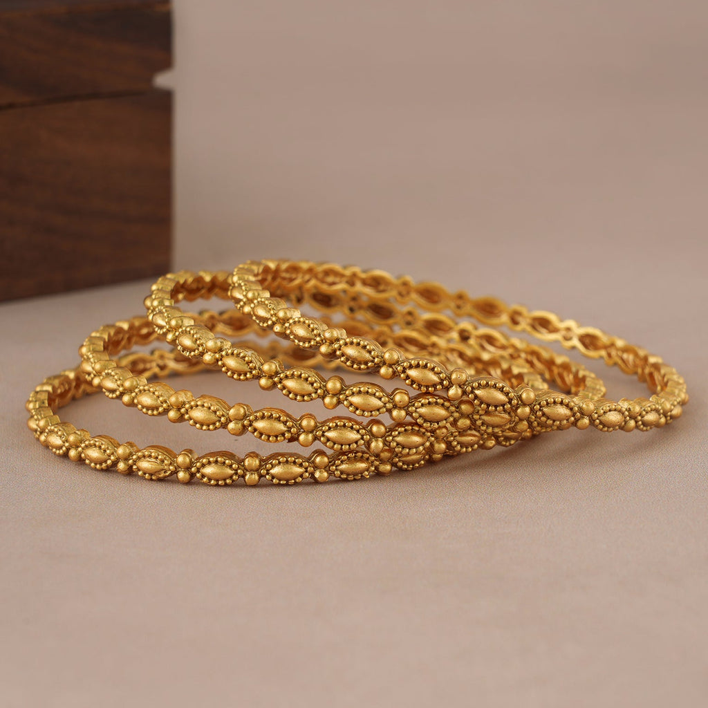 Sleek elegant antique gold plain bangle set (set of 4)