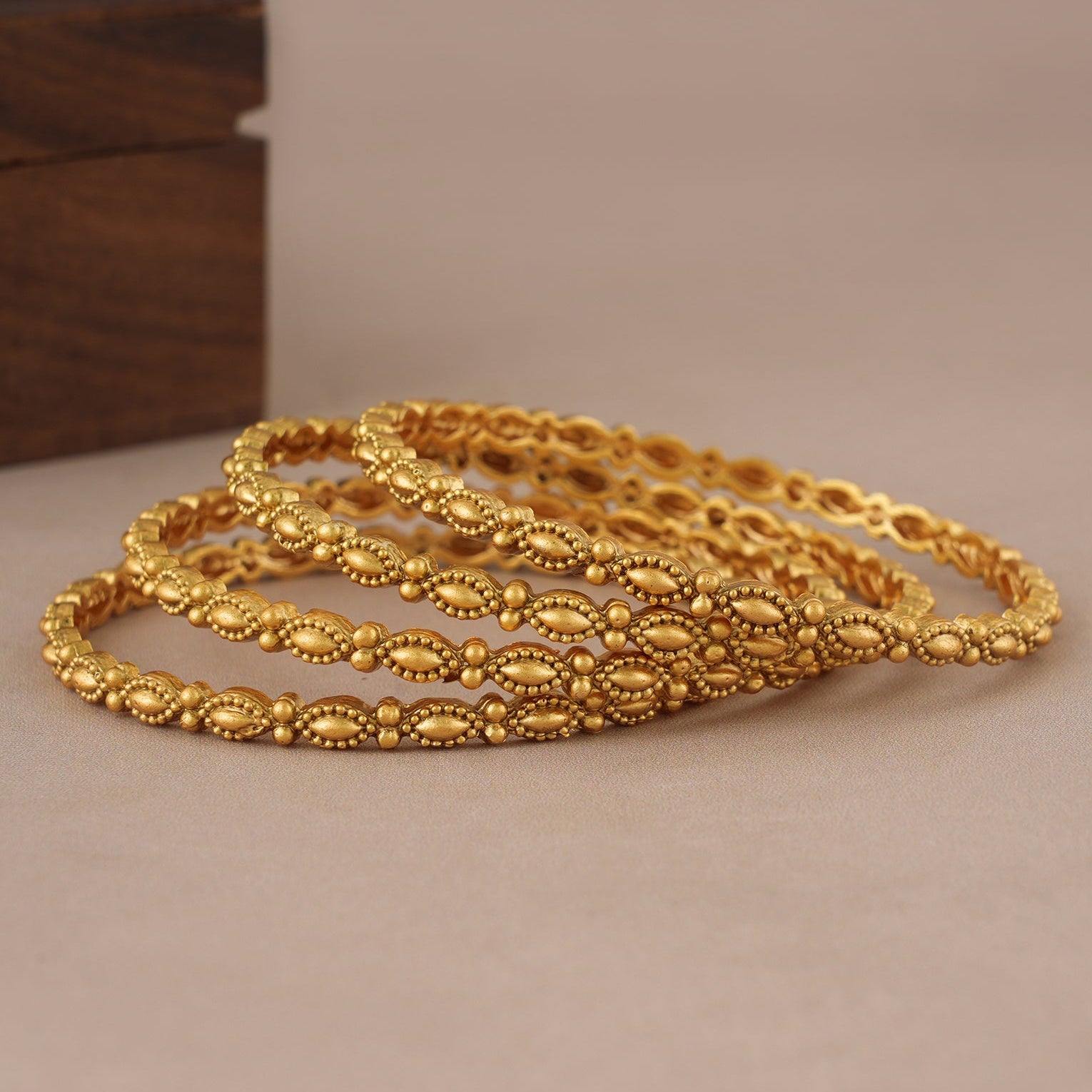 Sleek elegant antique gold plain bangle set (set of 4)