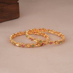 Sleek gold plated pear shaped stone bangle set