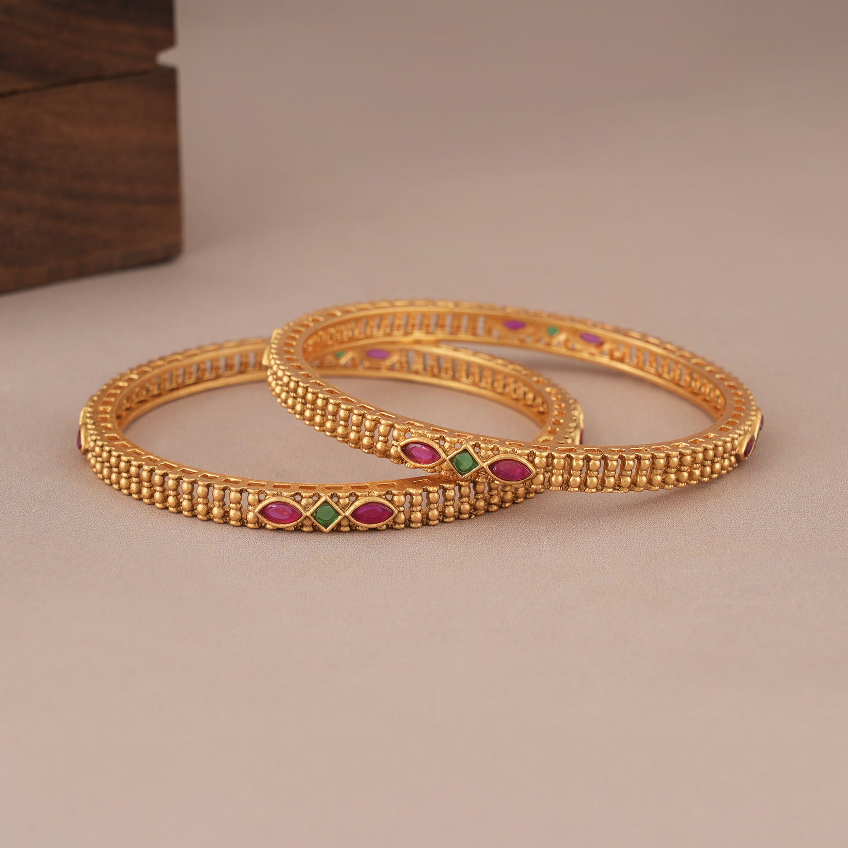 Sleek elegant stone antique gold bangle set for women