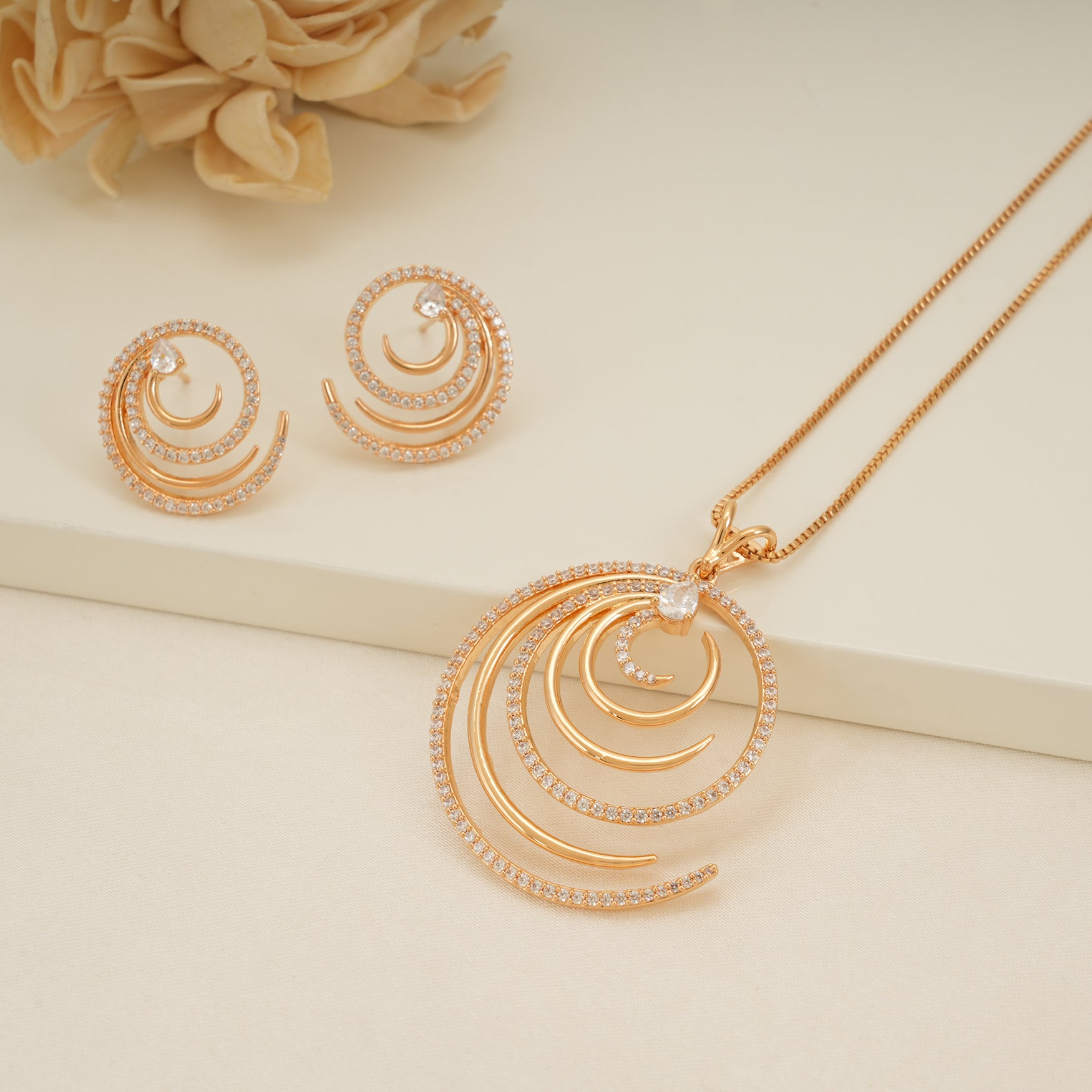 Stunning gold plated spiral diamond pendant set