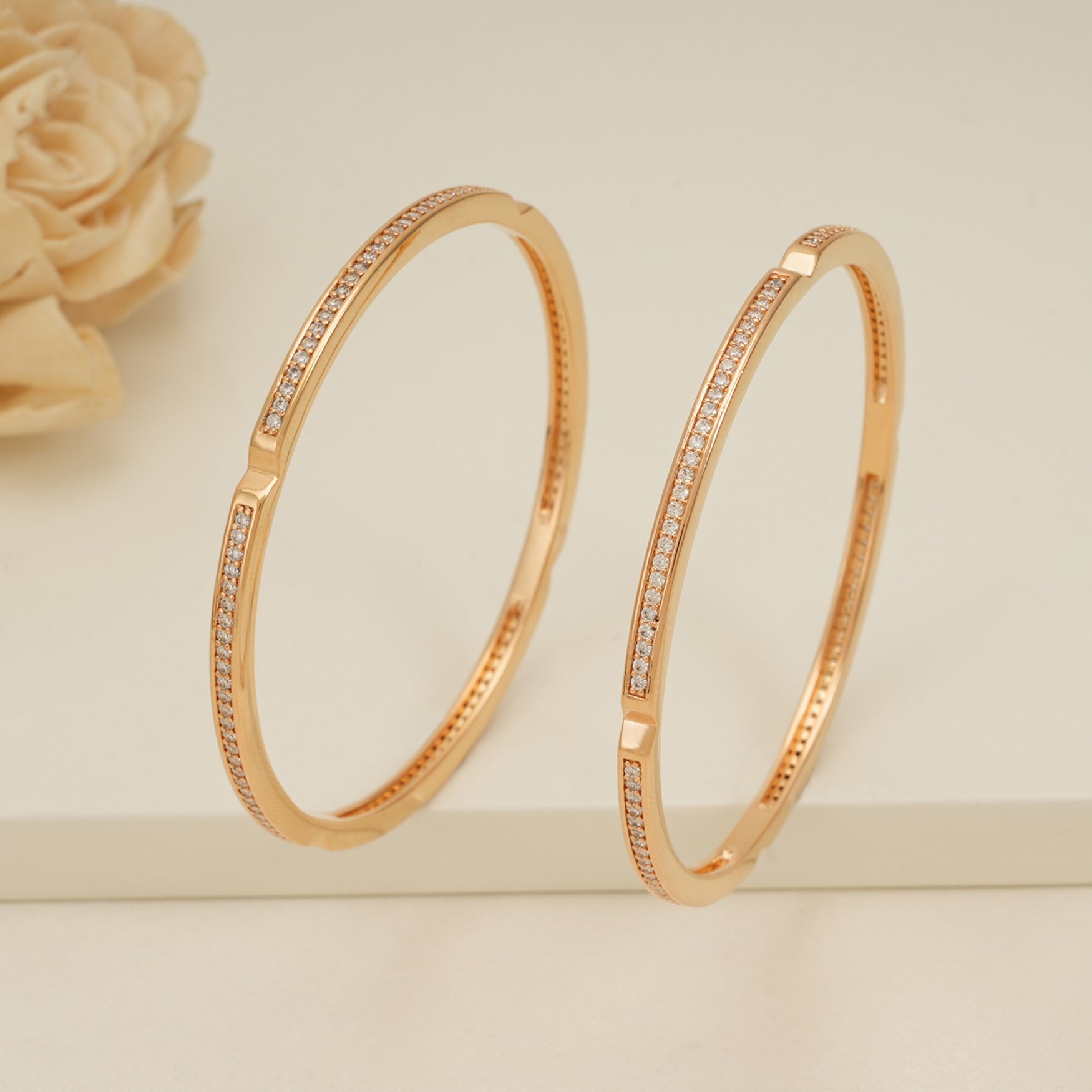 Sleek gold plated diamond bangle set for women