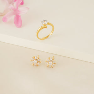 Stunning diamond solitaire ring with floral earring