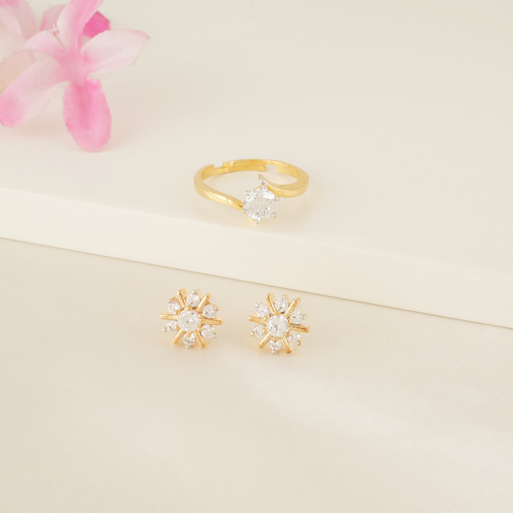 Stunning diamond solitaire ring with floral earring