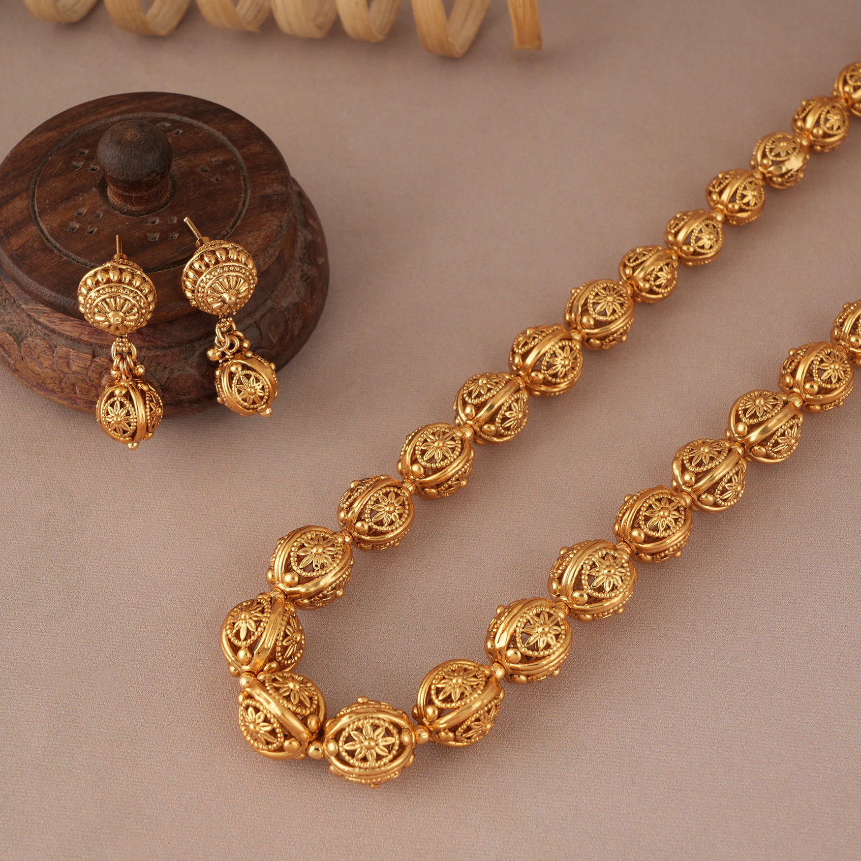 Long gold plated carved ball mala set