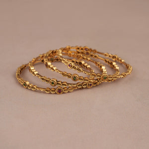 Stunning antique gold sleek multicolor bangle set (set of 4)