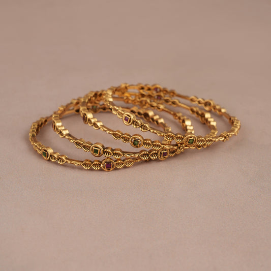 Stunning antique gold sleek multicolor bangle set (set of 4)