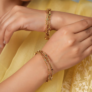 Stunning antique gold sleek multicolor bangle set (set of 4)