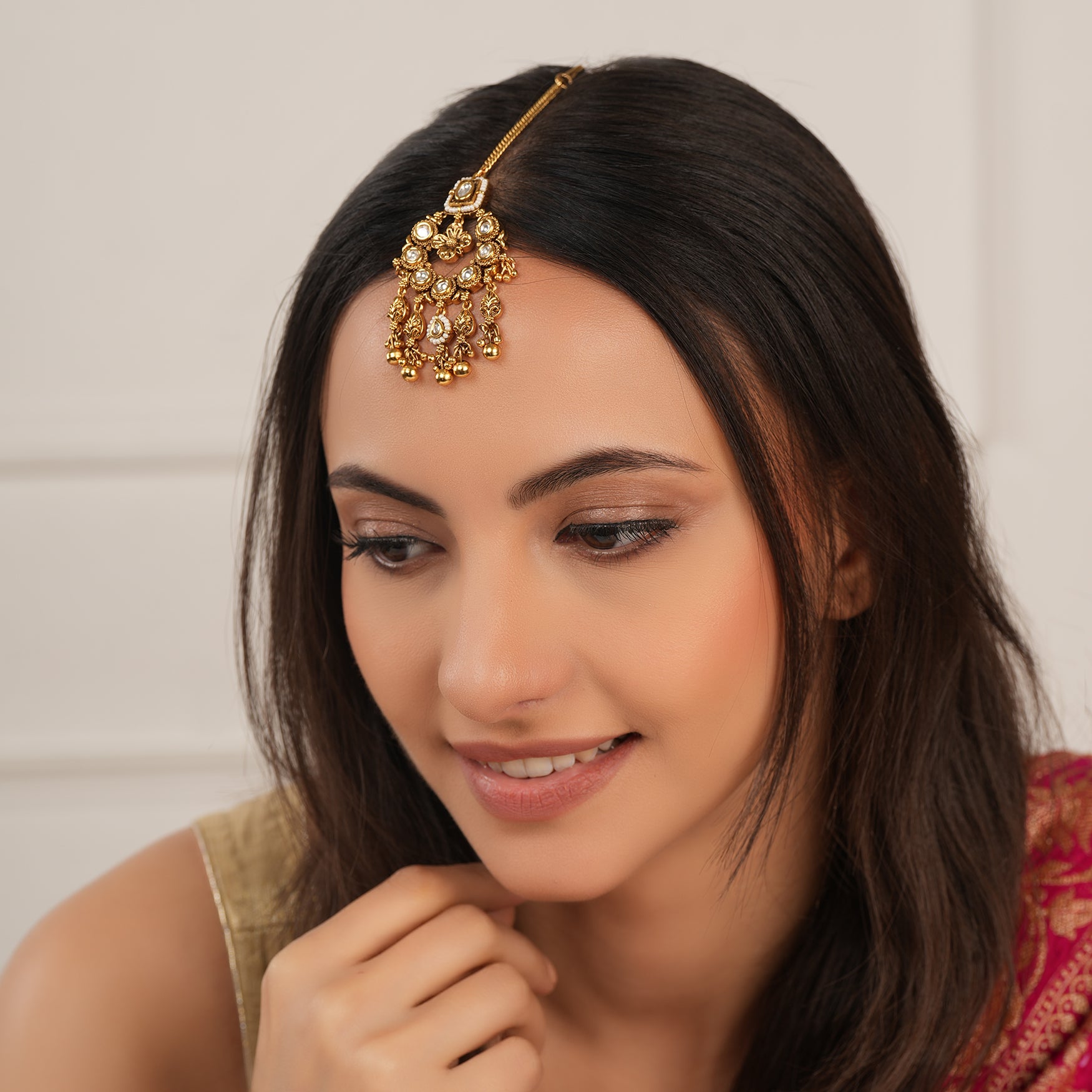 Stunning kundan antique maangtika with gold balls