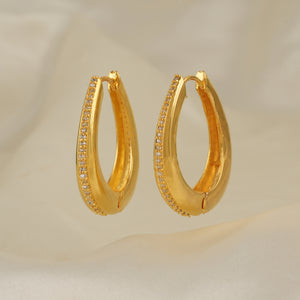 Stunning diamond studded demi fine hoop earring