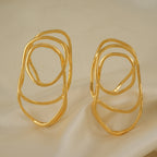 Stunning spiral demi fine gold earring