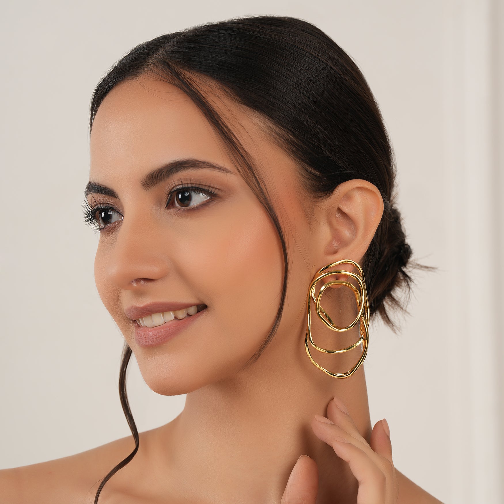 Stunning spiral demi fine gold earring