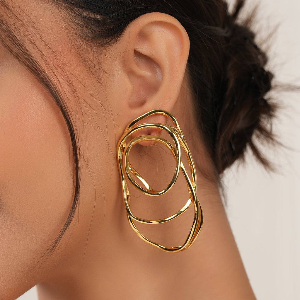 Stunning spiral demi fine gold earring