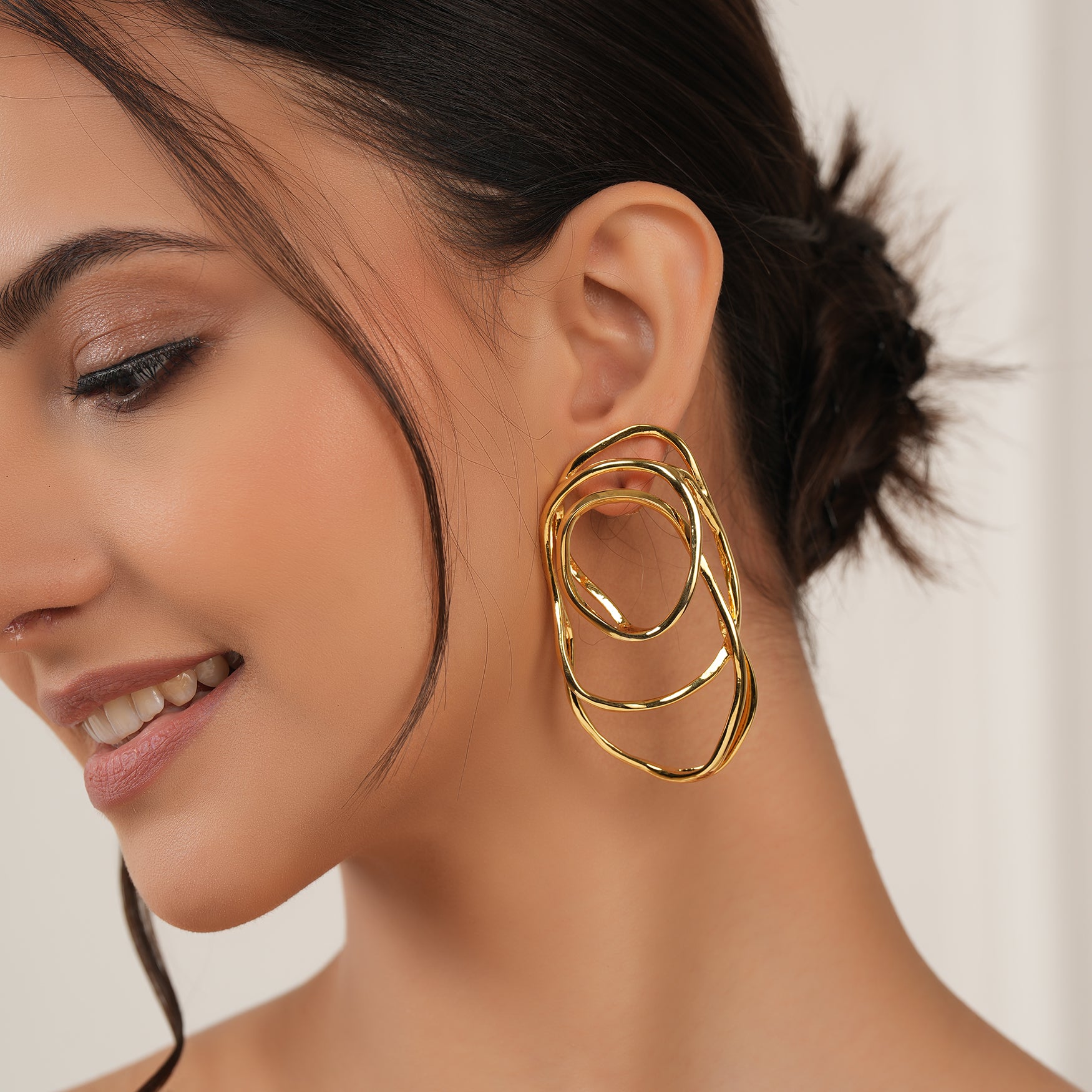 Stunning spiral demi fine gold earring