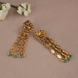 Long antique gold plated peacock earring