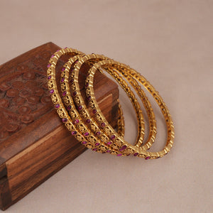 Beautiful antique gold plated sleek ruby stone bangle set
