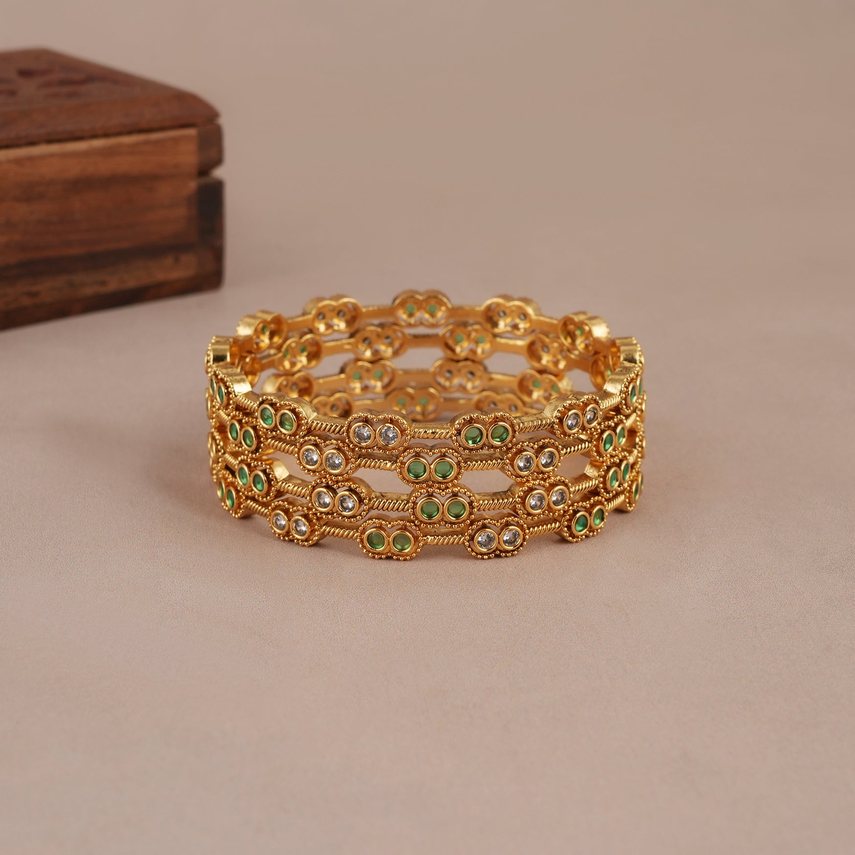 Elegant antique gold plated green stone kundan bangle set for women (set of 4)
