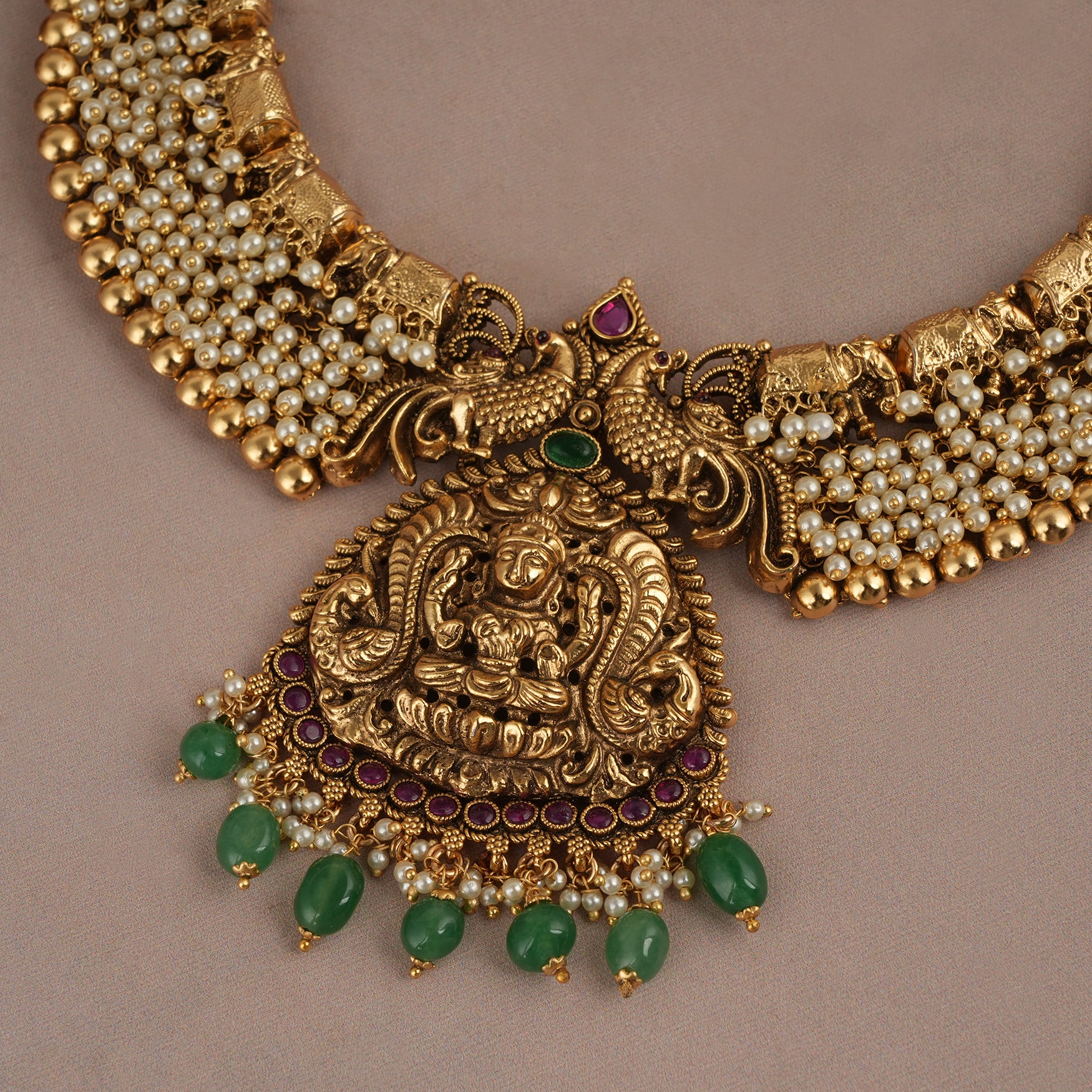 Gorgeous antique gold pearl maa lakshmi jewellery for women