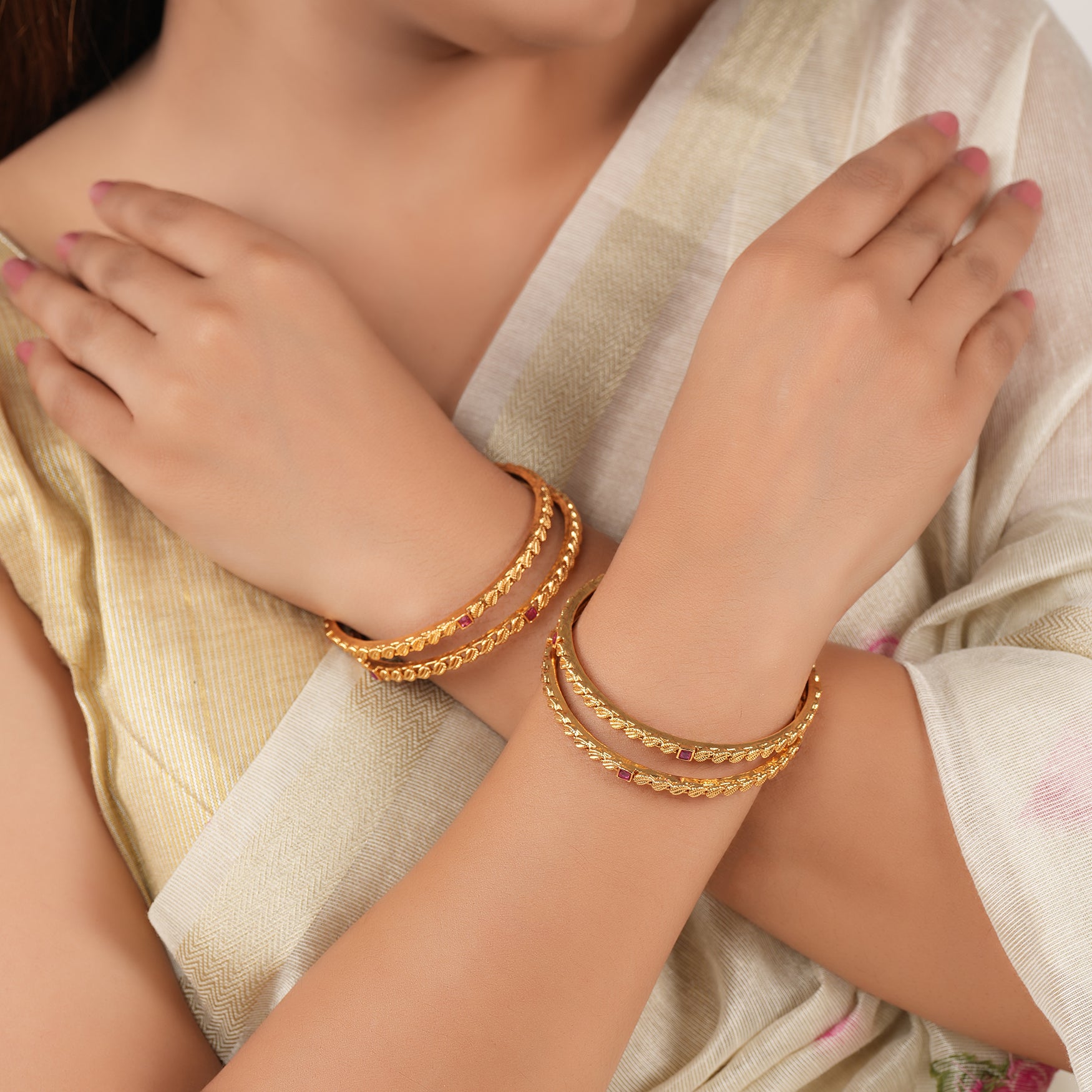 Sleek antique gold ruby stone bangle set