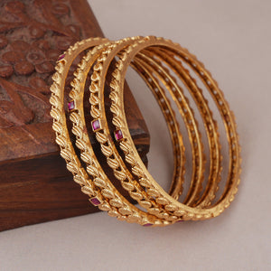 Sleek antique gold ruby stone bangle set